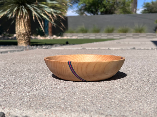 Handmade wooden maple bowl with blue and pink stripes