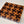 Load image into Gallery viewer, Maple and Walnut Pinwheel End Grain Cutting Board
